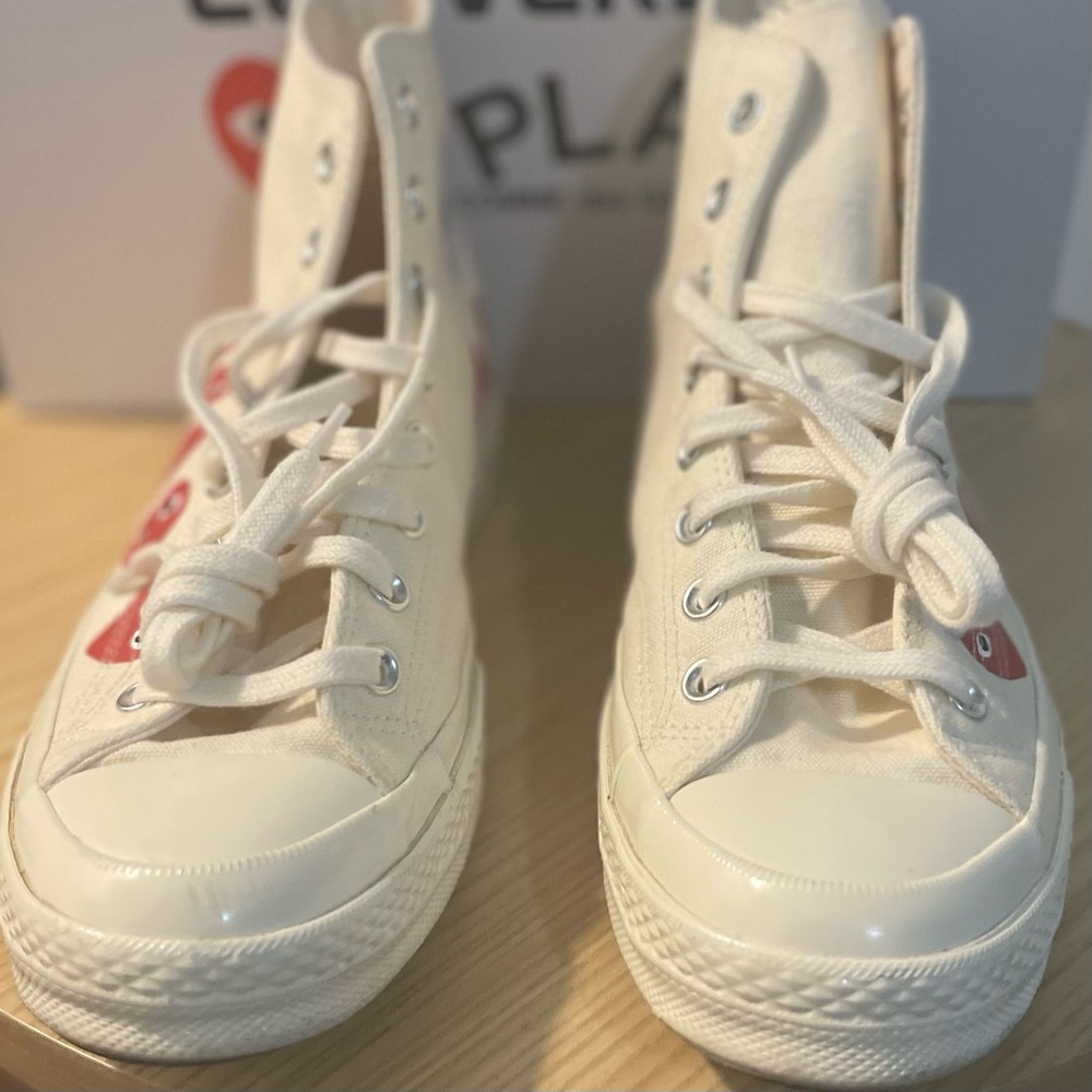 Pair of Comme Des Garons sneakers